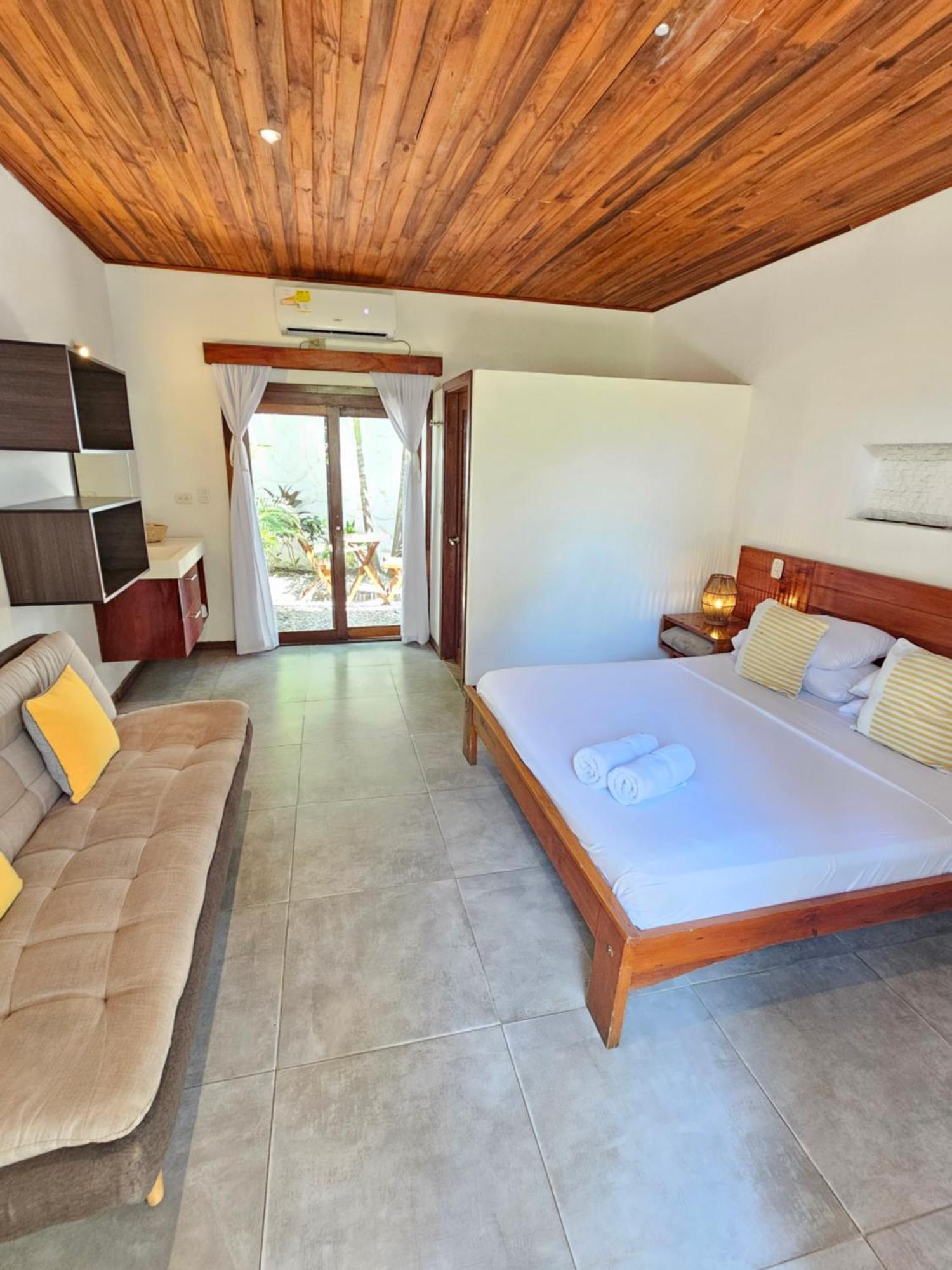 Makao Beach Hotel Palomino Quarto foto